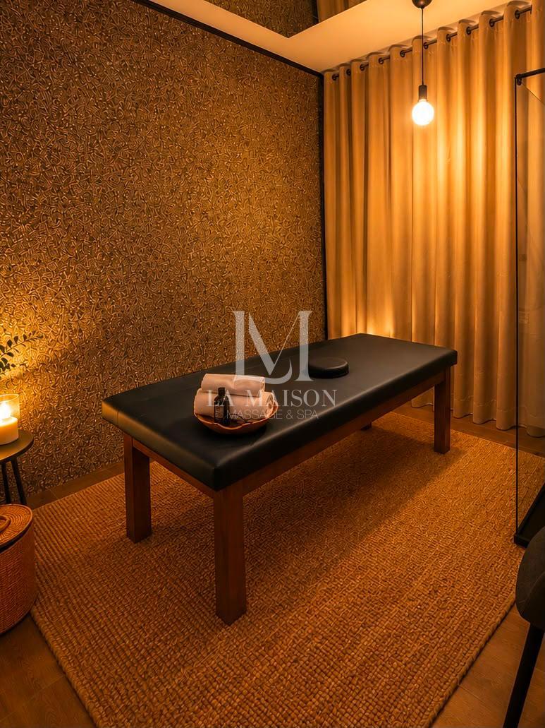 Signature massage oils and specialized milking table equipment at La Maison Spa Lisbon